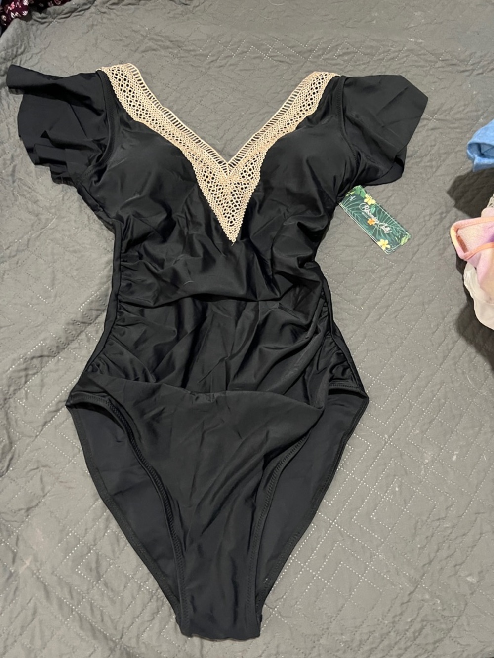 Black One-Piece Swim with Cream Crochet V-Neck